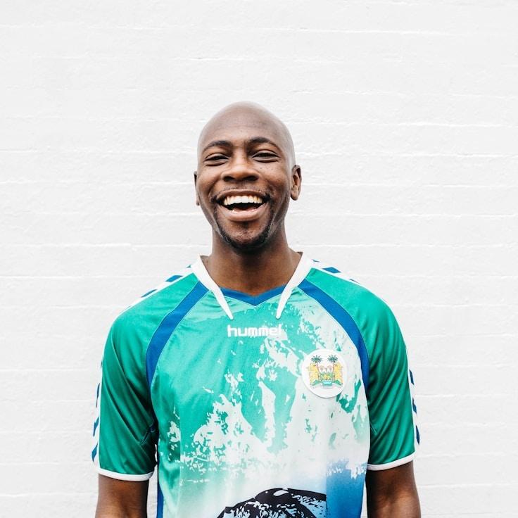 Kaveri Mehta, Lead Design Curator at QuietMatrixStudio, reviewing corporate floral arrangements